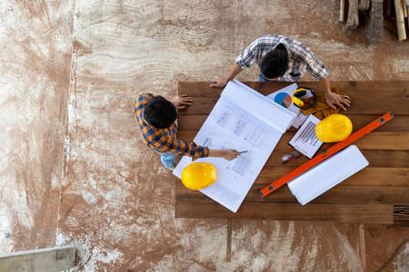 Architects and Engineer working in construction site.の写真素材