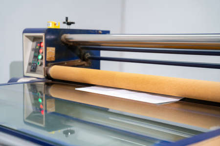 Heat transfer machinein workshop. Machine for screen shirt. clothing industry concept.の写真素材