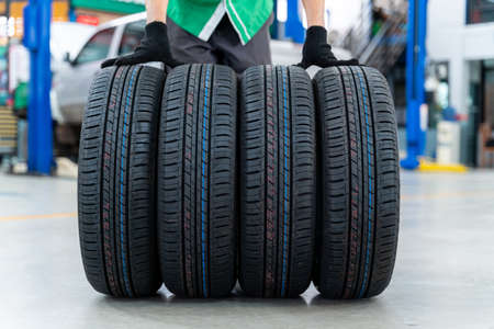 4 new tires in Car repair center.の写真素材
