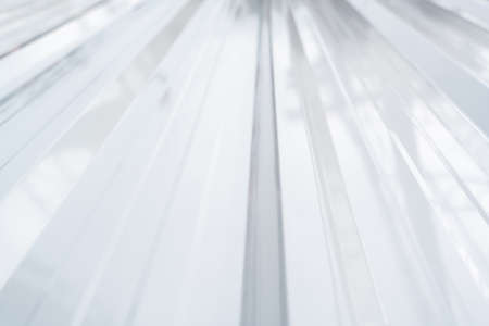 White roof sheet at the construction site. Install a new roof.の写真素材