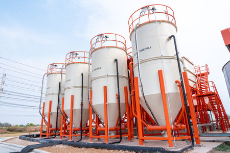 Large tank for filtering tap water with sand at a large industrial estate.の写真素材