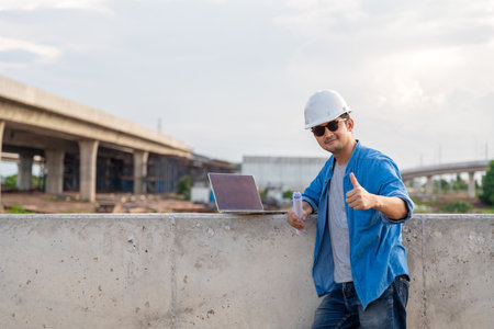 A contractor inspected at road construction site. Civil Engineer.の写真素材