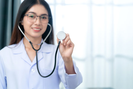Healthcare and medical concept. Medicine female doctor with stethoscope at the clinic.の写真素材