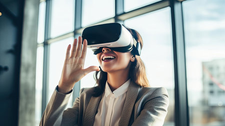 Happy young businesswoman using virtual reality headset in the office. Generative Aiの素材