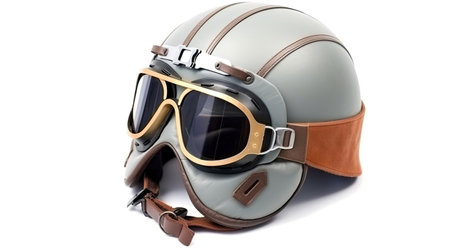 A new grey vintage helmet and wind goggle isolated on white background. Generative Aiの素材