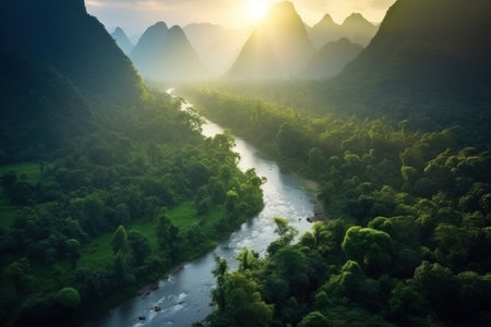 Aerial view of Beautiful natural scenery of river in southeast Asia tropical green forest with mountains in background.の素材