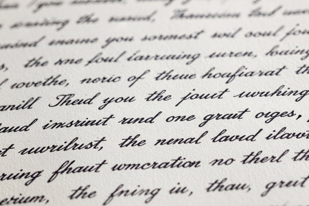 Emotional close up showing the weathered details of old stationery and cursive text perfect for depicting melancholy or longing.の素材