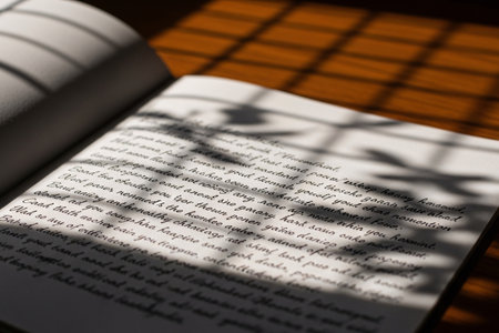The atmospheric play of sunlight and shadow on aged paper emphasizes the sentimental value of a handwritten valentine message.の素材