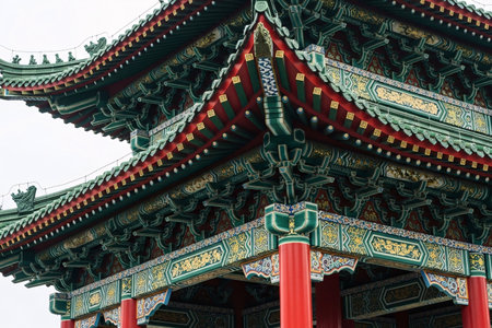 Eastern heritage ornamental pavilion structure detailing the layered construction and vibrant colors a high detail photo suitable for print.の素材
