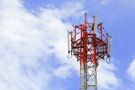 Telecommunication Tower with blue skyの写真素材