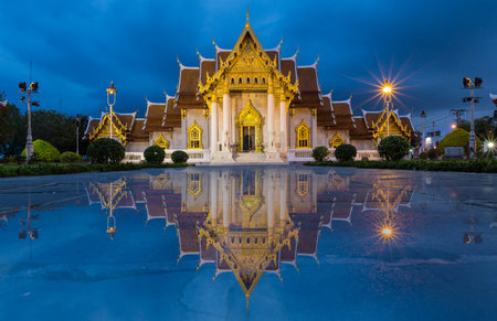 Beautiful Thai Temple, Marble Temple at twilight with water relfectionのeditorial素材