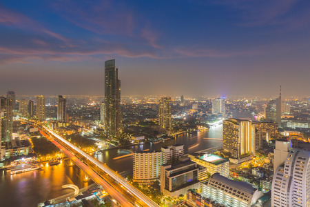 Twilight of Bangkok skylines with Chao Phraya river curve, Bangkok Thailandの写真素材