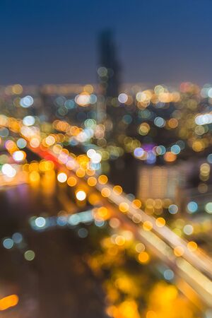 Defocused blue bokeh urban city background effectの写真素材