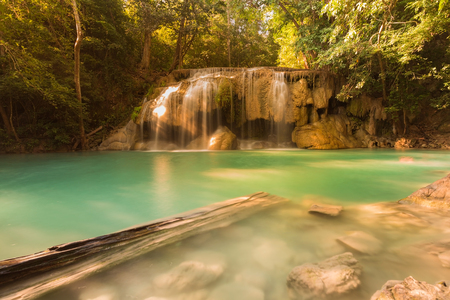 Water falls in spring season located in deep rain forest jungleの写真素材