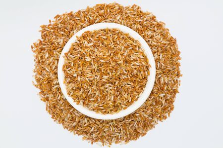 Mixed coarse rice on white backgroundの写真素材