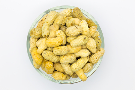 Cup of dried peanut in the glass bowlの写真素材