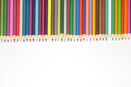 Multiple color wooden pencils on white backgroundの写真素材