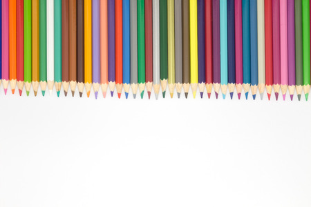Education object, close up of multiple color pencils on white backgroundの写真素材