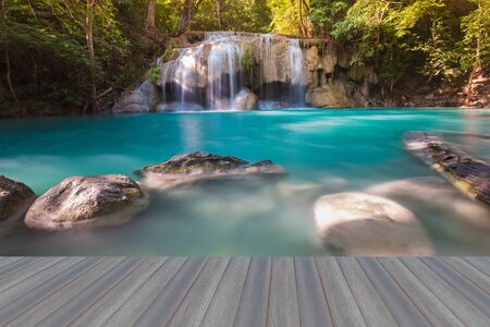 Opening wooden floor, Deep forest waterfall in national park of Thailandの写真素材