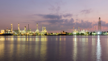 Oil refinery along with river before sunrise, Bangkok Thailand