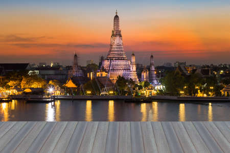 Opening wooden floor, Twilight at Wat Arun, Bangkok Thailandの写真素材
