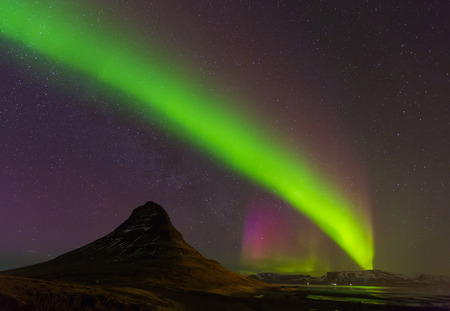 Northern Light Aurora borealis at Kirkjufell Iceland with fully start in the skyの写真素材