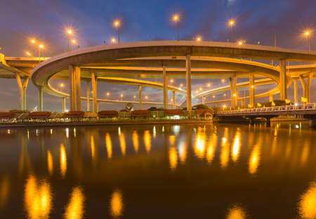 Twilight, Highway interchanged with reflection lights river frontの写真素材