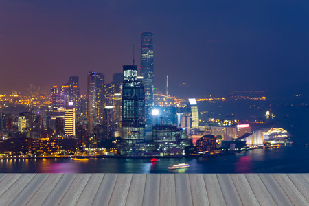 Opening wooden floor, Bokeh light background of Hong Kong Victoria peak, abstract backgroundの写真素材