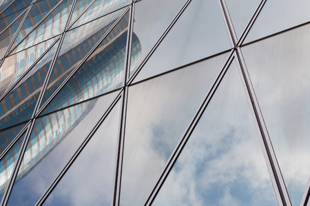 Close up office building window with reflectionの写真素材