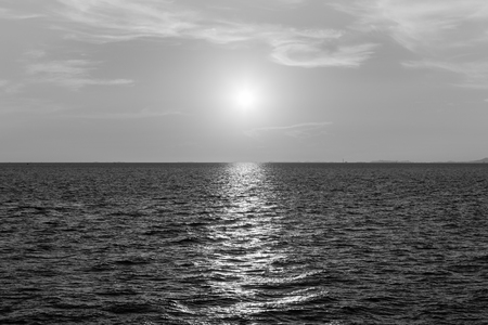 Black and White, Sunset over ocean skyline, natural landscape backgroundの写真素材