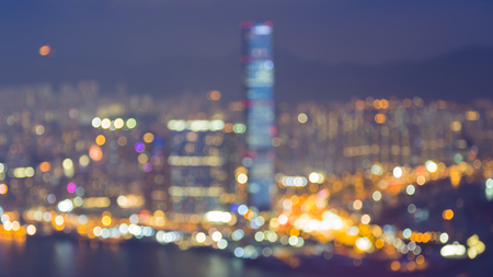 Blurred light Hong Kong city aerial view over Victoria bay, night view, abstract backgroundの写真素材
