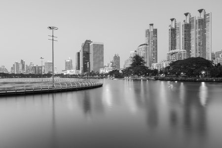 Black and White, Bangkok city business building with reflection in water lake, Thailandのeditorial素材