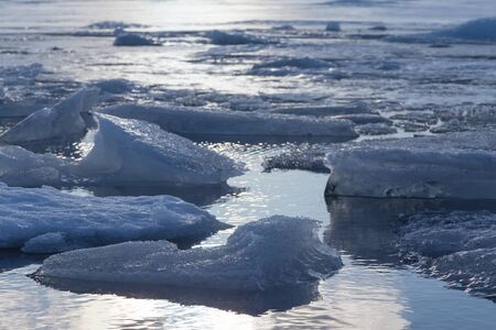 Beautiful natural Ice breaking over the lake in winter season, Iceland natural winter landscape backgroundの写真素材