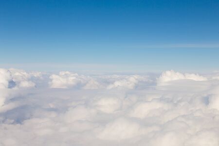 Soft white cloud and blue skyline natural landscape backgroundの写真素材