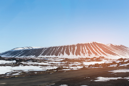 Winter season volcano with blue clear sky background, Iceland natural landscape backgroundの写真素材