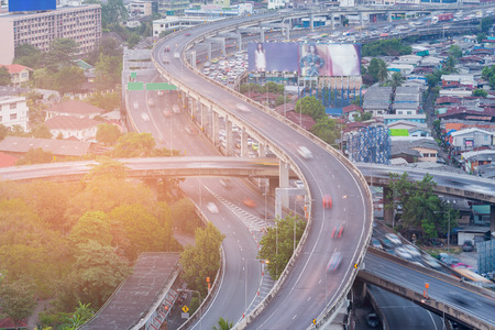 Highway interchange aerial view with motion blurred car moving