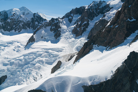 Beautiful Fox mountain high hill with white snow covered, New Zealand natural landscape backgroundの写真素材