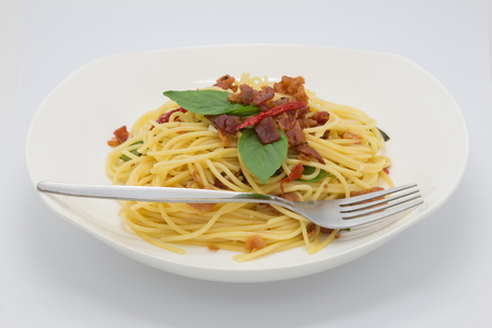 Homemade dry pork spaghetti on white backgroundの写真素材