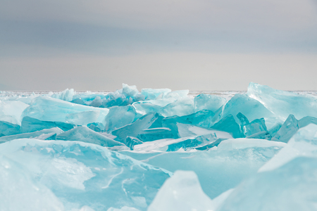Ice crack over Baikal water winter season lake, natural landscape backgroundの写真素材