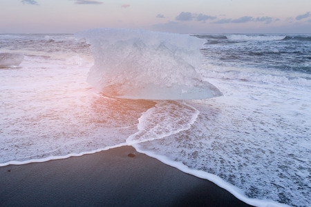 Ice on black sand Diamond beach Jokulsarlon Iceland winter season, natural landscape backgroundの写真素材