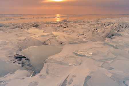 Breaking ice surface with sunset skyline, Baikal Russia winter seasonの写真素材