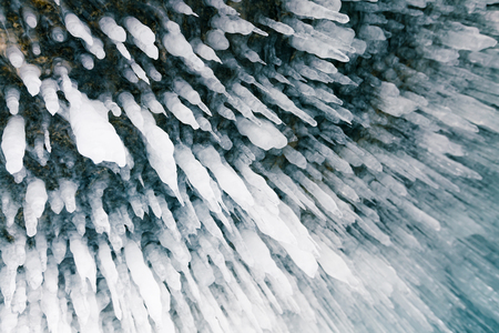 Ice cave roof top close up, winter season natural landscape backgroundの写真素材
