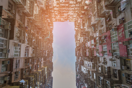 City apartment bottom view, Hong Kong cityscape downtown backgroundの写真素材