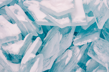 Breaking Ice in water lake close up, Baikal Russia winter season natural landscape backgroundの写真素材