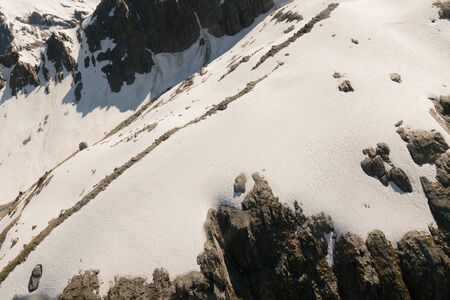 Mountain slope with white soft snow covered, natural landscape background