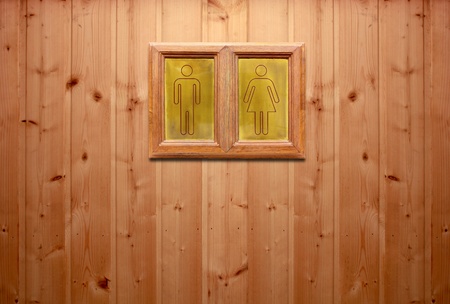 wooden sign for Man & Woman restroom on wooden wallの写真素材