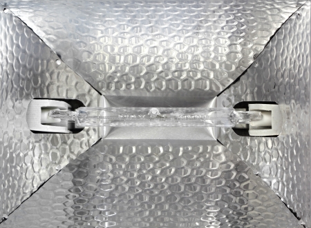 Light bulb on the aluminum  reflectionの写真素材