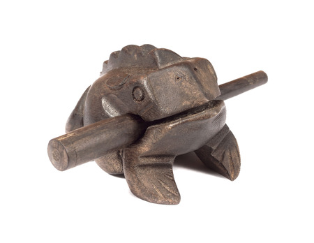 wooden frog on white backgroundの写真素材