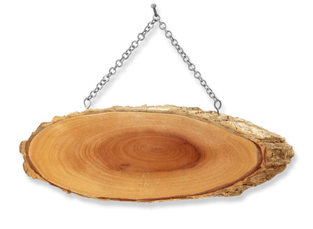 Wooden sign hanging on a chain  isolated on whiteの写真素材