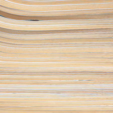 close up of books stacked on a shelf.の写真素材